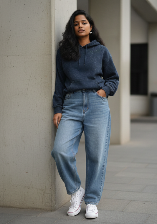 mineral-wash unisex heavyweight hoodie. 300 GSM cotton brushed fleece with a distressed, textured finish. Features a kangaroo pocket, matching drawstrings, and ribbed finishes. Architectural streetwear fit for cold weather. Blue Hoodie. acid washed hoodie