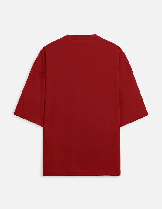 Color_Red. Oversized burgundy streetwear t-shirt featuring a small white phoenix graphic on the left chest. Features dropped shoulders, heavyweight cotton fabric, and a boxy fit.