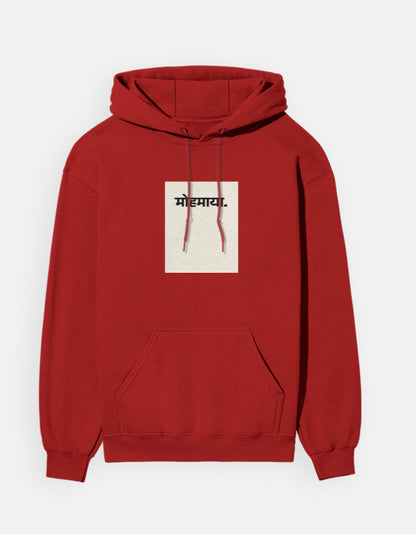 Color_Red. unisex heavyweight hoodie featuring a centered cream rectangular block with black "मोहमाया." (Mohmaya) Devanagari script. 300 GSM cotton brushed fleece with kangaroo pocket and ribbed finishes. Structured streetwear fit for cold weather.