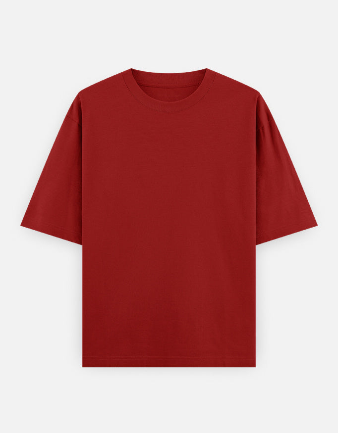 Color_Red. Oversized plain classic streetwear t-shirt in a premium heavyweight cotton blend. Features a boxy silhouette, dropped shoulders, and a clean, minimalist aesthetic without graphics.