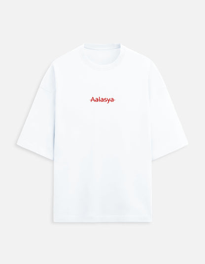 Color_White. versized unisex t-shirt featuring a centered, small graphic of the word "Aalasya" (laziness) written in red, stylized text with a red strikethrough line, signifying "No Laziness." Soft cotton, drop-shoulder, boxy casual apparel with ironic or statement typography.