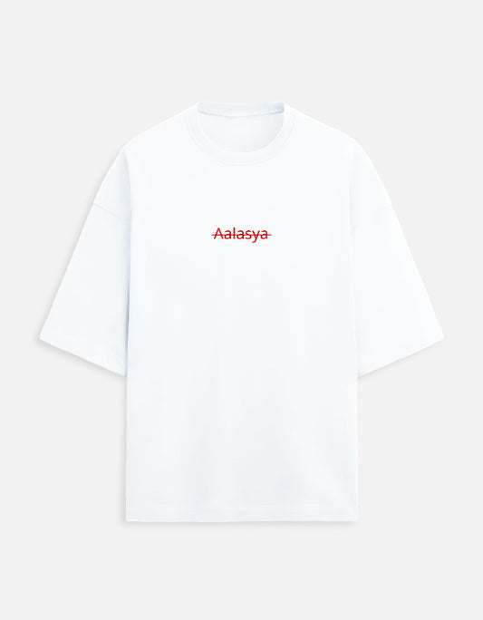 Color_White. versized unisex t-shirt featuring a centered, small graphic of the word "Aalasya" (laziness) written in red, stylized text with a red strikethrough line, signifying "No Laziness." Soft cotton, drop-shoulder, boxy casual apparel with ironic or statement typography.