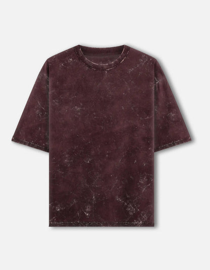 Color_Maroon. Oversized unisex t-shirt with a vintage acid-washed or mineral-wash texture. Features a faded, marbled grey and black aesthetic with a drop-shoulder, boxy fit. High-quality cotton streetwear with a distressed, retro finish.