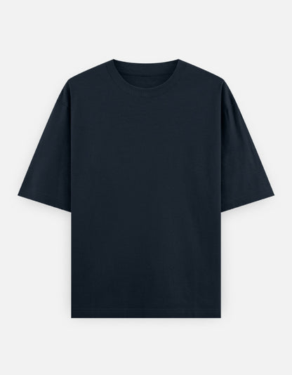 Color_NavyBlue. High-quality oversized unisex t-shirt with a classic crew neck and drop-shoulder construction. Smooth, heavy-weight cotton fabric in a solid color, offering a relaxed, boxy streetwear fit for a timeless aesthetic.