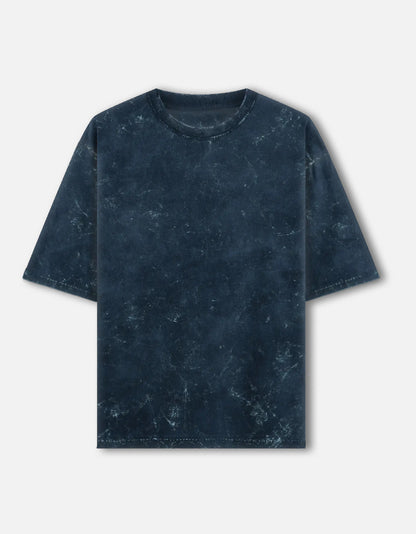 Color_NavyBlue. Oversized unisex t-shirt with a vintage acid-washed or mineral-wash texture. Features a faded, marbled grey and black aesthetic with a drop-shoulder, boxy fit. High-quality cotton streetwear with a distressed, retro finish.
