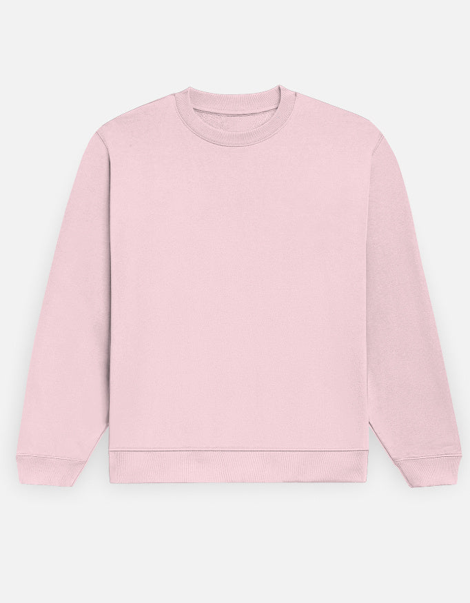 Color_LightBabyPink. Premium solid-colored unisex crewneck sweatshirt made from 100% cotton and 300 GSM brushed fleece. Features a relaxed regular fit with snug ribbed cuffs and a structured hem. High-quality, heavyweight cozy apparel designed for cold weather and casual streetwear.