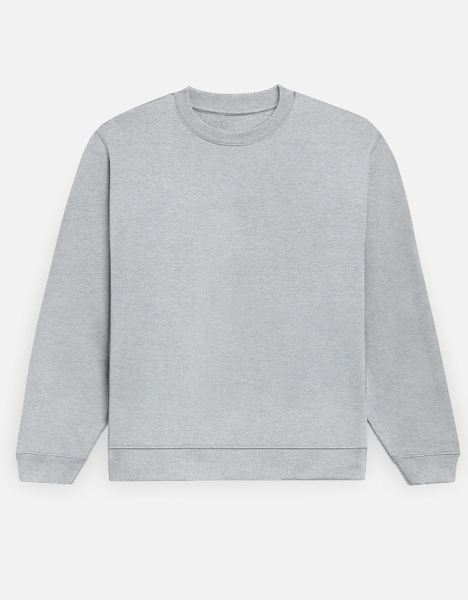 Color_GreyMelange. Premium solid-colored unisex crewneck sweatshirt made from 100% cotton and 300 GSM brushed fleece. Features a relaxed regular fit with snug ribbed cuffs and a structured hem. High-quality, heavyweight cozy apparel designed for cold weather and casual streetwear.