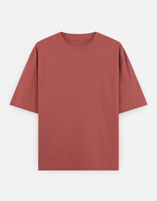 Color_Coral. Oversized plain classic streetwear t-shirt in a premium heavyweight cotton blend. Features a boxy silhouette, dropped shoulders, and a clean, minimalist aesthetic without graphics.