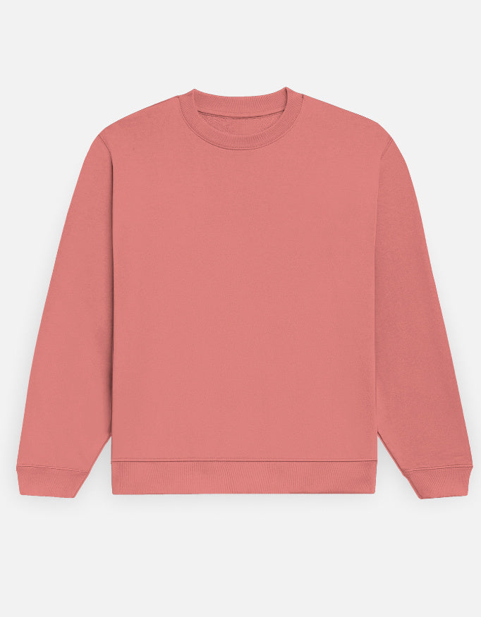Color_Coral. Premium solid-colored unisex crewneck sweatshirt made from 100% cotton and 300 GSM brushed fleece. Features a relaxed regular fit with snug ribbed cuffs and a structured hem. High-quality, heavyweight cozy apparel designed for cold weather and casual streetwear.