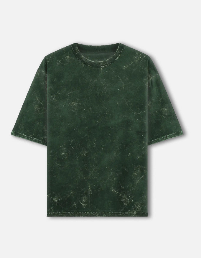 Color_BottleGreen. Oversized unisex t-shirt with a vintage acid-washed or mineral-wash texture. Features a faded, marbled grey and black aesthetic with a drop-shoulder, boxy fit. High-quality cotton streetwear with a distressed, retro finish.
