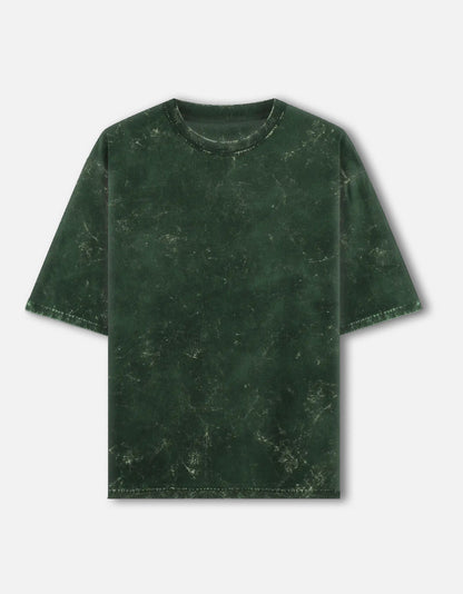 Color_BottleGreen. Oversized unisex t-shirt with a vintage acid-washed or mineral-wash texture. Features a faded, marbled grey and black aesthetic with a drop-shoulder, boxy fit. High-quality cotton streetwear with a distressed, retro finish.