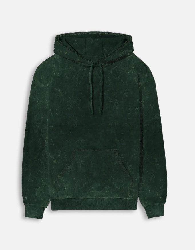 Color_BottleGreen. mineral-wash unisex heavyweight hoodie. 300 GSM cotton brushed fleece with a distressed, textured finish. Features a kangaroo pocket, matching drawstrings, and ribbed finishes. Architectural streetwear fit for cold weather.